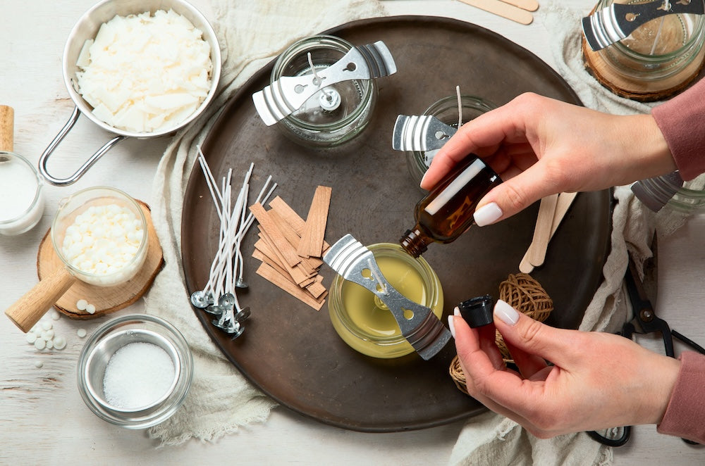 soy wax flakes on a wooden spoon and cutting board